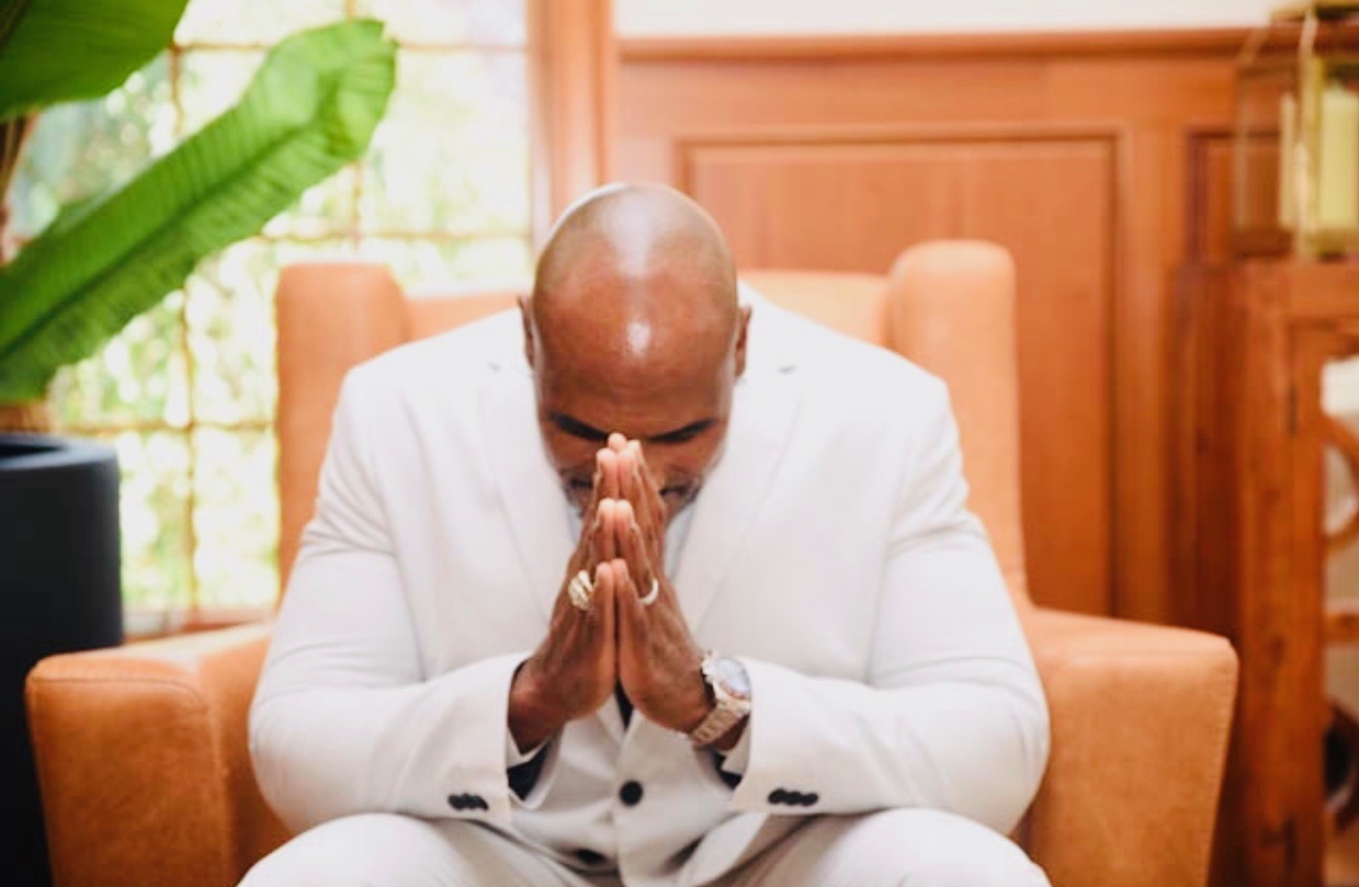 Founder in prayer